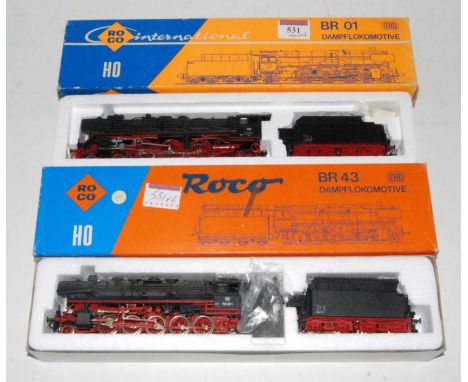 A Roco H0 ref. 04126A DB black class BR43 2-10-0 engine and tender (NM-BNM) and sold with ref. 04119B DB black class BR01 4-6