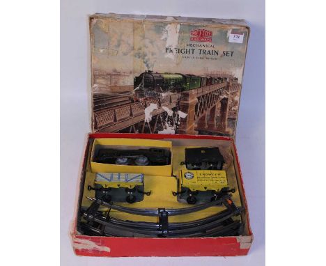 A Mettoy Railways Mechanical Freight Train Set, much tape repaired box with picture of Peppercorn locomotive hauling train, c