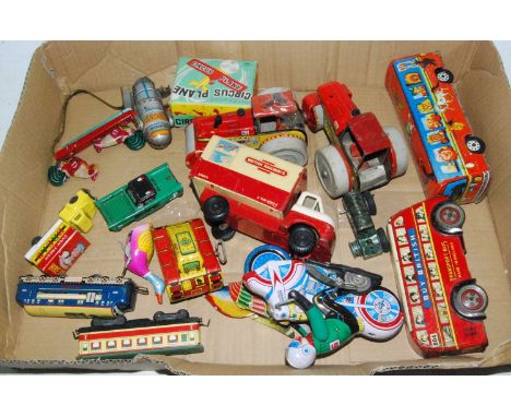 One box containing a quantity of mixed tinplate and clockwork vehicles and accessories to include a tinplate Buy British Tran