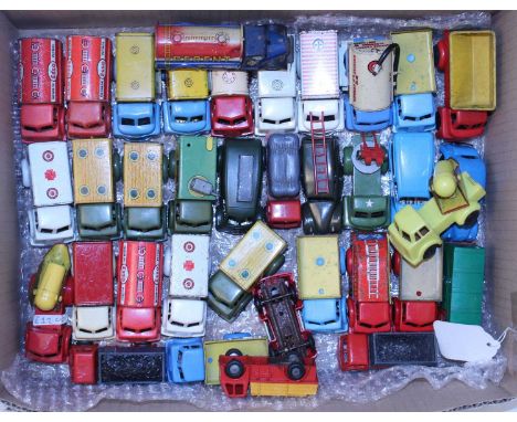 One tray containing 35 Wells, Brimtoy and Pocketoy and Triang Minic plastic and tinplate vehicles and accessories, to include