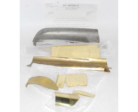Whitemetal castings and brass etchings to make an 0 gauge class A4 engine and tender with instructions, a basic kit which req