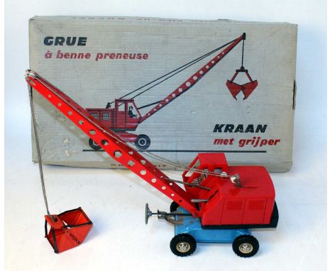 A Joustra Ref. No. 496 tinplate and clockwork model of a "Grue" wheeled crane, comprising of red tinplate and plastic body wi