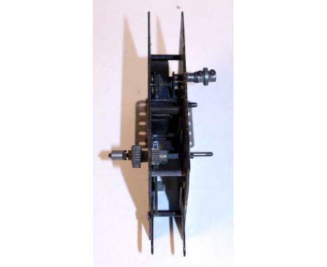 Meccano No. 2 1912 clockwork motor complete with original dog clutch, spacer and starter button, plating almost gone (G)