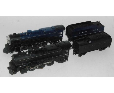 Two Lionel Lines locomotives black 2-6-2 engine and tender No. 8001 (G), and black/blue 4-6-2 engine and tender No. 658 (G)