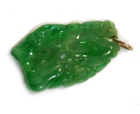 A Chinese apple-green jade-type pendant, 20th century,  the pendant carved and pierced with birds perched on branches4 x 2.5c