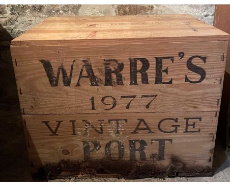 Warre's Vintage Port 1977,  12 bottles, in damp damaged owc.Note: The base of the box has rotted away.  One level is low shou
