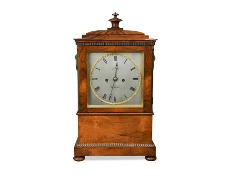 A Regency rosewood table clock, the 18cm silvered dial signed 'Heald Wisbeach', the rectangular finial topped case with twin 