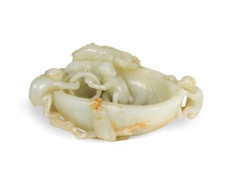 A Chinese mutton fat jade ape and fruit bowl,  Qing Dynasty, 19th century, the three small apes playing and clambering on the