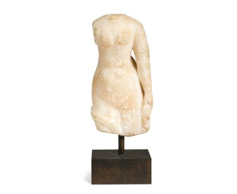A Roman white marble nude female torso,  the existing left armband and sash over her right upper leg18cm highProvenance:Joann