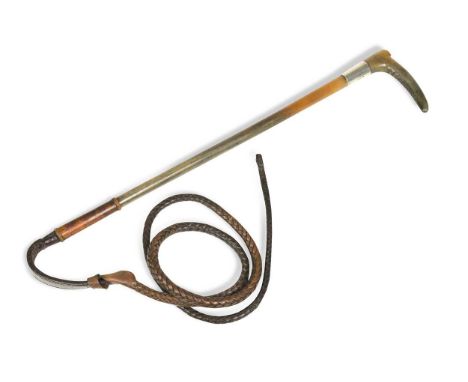 A George V rhinoceros horn boot crop,  hallmarks for London 1923, with boot form handle, braided leather whip178cm longhandle