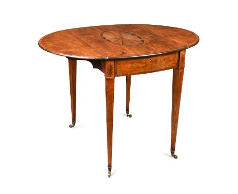 A George III satinwood and mahogany Pembroke table, in the Sheraton style, the crossbanded oval drop flap top with central fa