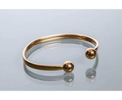 GOLD BANGLE
unmarked, tests as nine carat gold, 8.5g