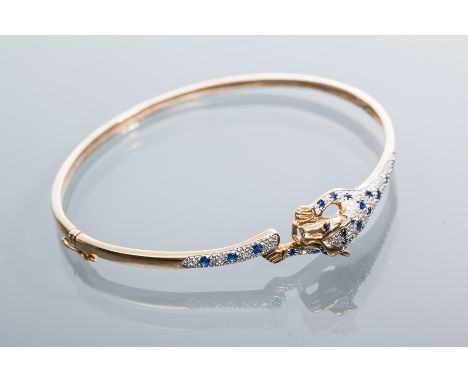 SAPPHIRE AND DIAMOND PANTHER BANGLE
pave set with round sapphires and diamonds, hallmarked 375 for nine carat gold