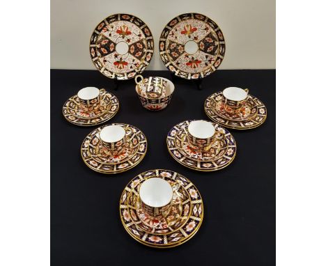 ROYAL CROWN DERBY TEA SERVICEin the Imari pattern 2451, comprising twelve tea cups and saucers, twelve side plates, two sandw