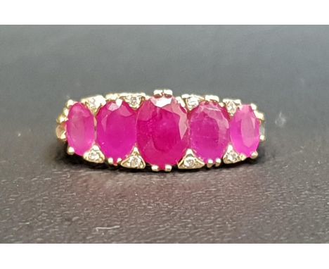 GRADUATED RUBY FIVE STONE RINGthe five oval cut rubies ranging from 0.75cts in the centre and 0.25cts to the sides, on nine c