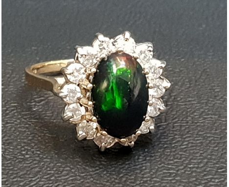 UNUSUAL BLACK OPAL AND DIAMOND CLUSTER RINGthe central oval cabochon opal in fourteen diamond surround, on nine carat gold sh
