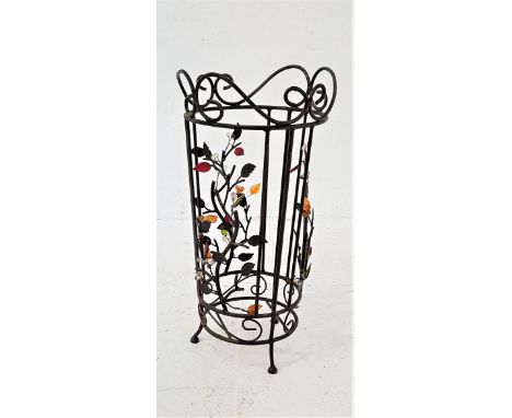 DECORATIVE STEEL STICK STANDwith a shaped circular top above panels decorated with leaves and coloured glass, 47cm high 