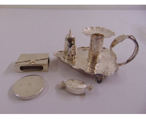 A quantity of silver to include a match slide, a bonbon dish, a pill box and a silver plated chamber stick