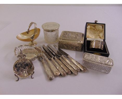 A quantity of silver and white metal to include covered boxes, bonbon dishes, a cased napkin ring and tea knives with silver 