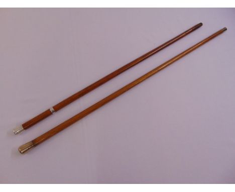 A mahogany walking stick with a brass top for Royal Army Medical Corps and another with silver mounts