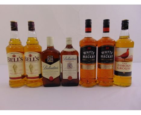 Seven bottle of Scotch whisky to include two Bells litres, two Whyte &amp; Mackay litres, one The Famous Grouse litre and Two