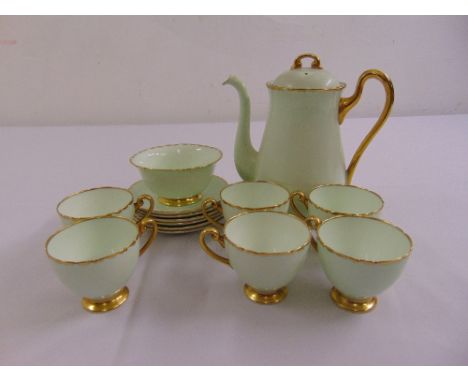 A Shelley coffee set in mint green with gilded borders to include cups, saucers, a coffee pot and sugar bowl (14)