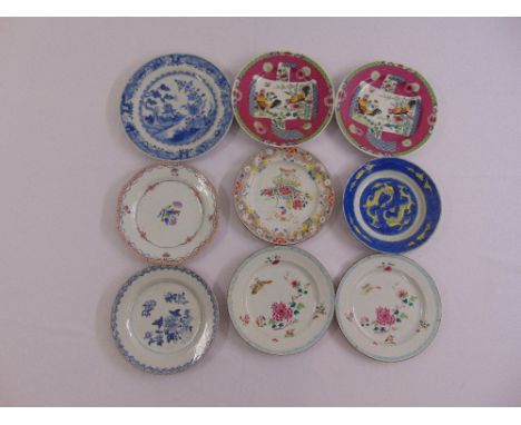 A quantity of ceramic wall plates of varying size and style (9)