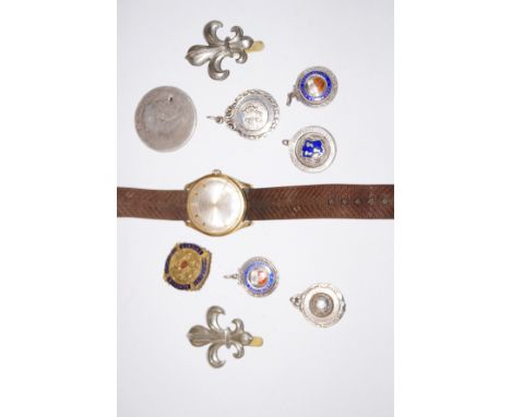 A collection of medals, broaches and a vintage Rotary wrist watch untested 
