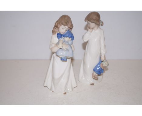 2 nao figures of young girls 