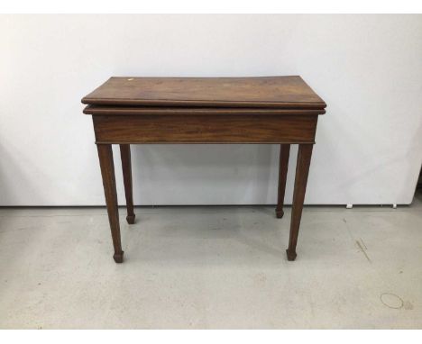 Early 19th century mahogany card table, rectangular moulded top with baize lined interior, on square tapered legs and spade f