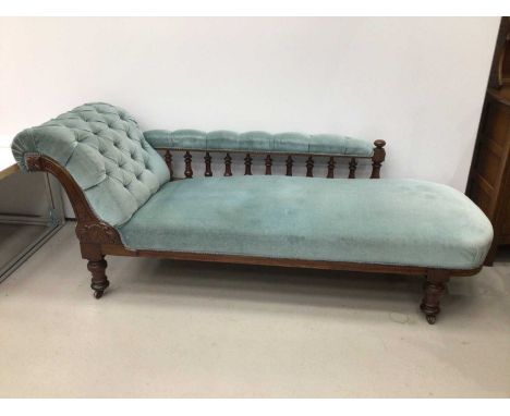 Victorian mahogany chaise longue, with blue velvet button upholstery on castors