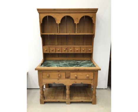 Victorian style pine two-height dresser, the plate rack with arcaded frieze, 8 spice drawers, the base with green marble top,