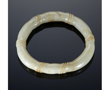 A CHINESE WHITE JADE BANGLE IN THE FORM OF BAMBOO, 20TH C 7cmGood conditiond 