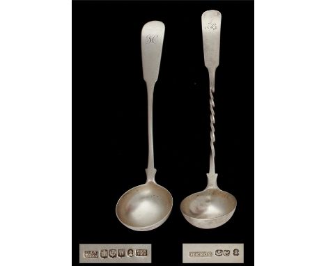 A SCOTTISH GEORGE III SILVER TODDY LADLE Oar pattern with spiral stem, by James Heron of Greenock, Edinburgh 1810 and another