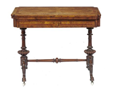 A VICTORIAN WALNUT, AMBOYNA AND LINE INLAID CARD TABLE, C1860  the quarter veneered top with re-entrant angles, pottery casto