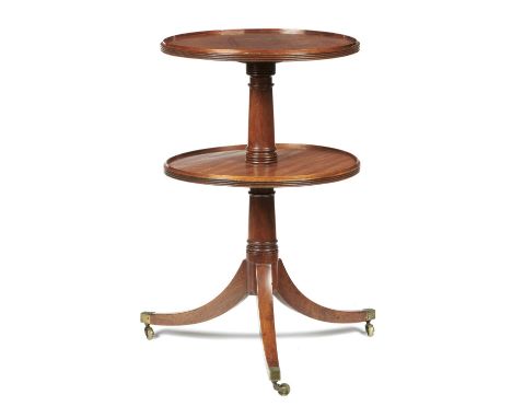 A GEORGE III MAHOGANY DUMB WAITER, C1800   of two round galleried tiers on tripod with brass capped castorsm, 96cm h; 58cm di