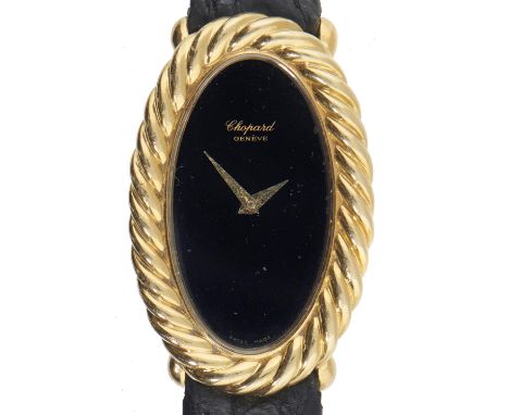 A CHOPARD OVAL 18CT GOLD LADY'S WRISTWATCH Ref  87122/50571, No 15477261, with black dial, 2.3 x 3.6cmIn apparently good work