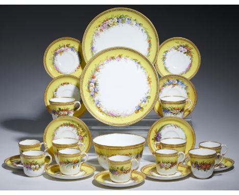 A ROYAL WORCESTER JEWELLED YELLOW GROUND TEA AND COFFEE SERVICE, C1880  painted, possibly by George Hundley, with trailing fl