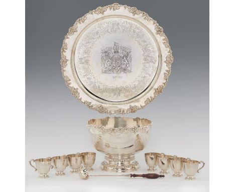 AN ELIZABETH II ROYAL SILVER WEDDING COMMEMORATIVE SILVER PUNCH SET  comprising punch bowl, ladle, eight cups and salver, wit