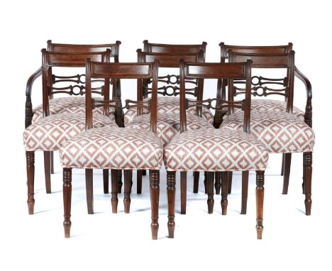 A SET OF EIGHT GEORGE IV MAHOGANY DINING CHAIRS, C1820 on turned legs, including an elbow chairWear to arms and legs consiste