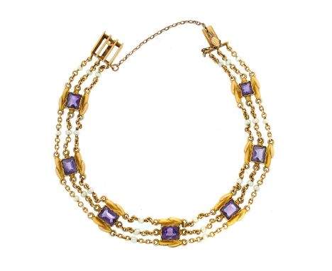 AN AMETHYST, PEARL AND GOLD BRACELET, C1900 the step cut amethysts divided by triple chains with pearls at intervals, gate cl
