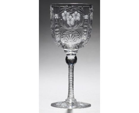 AN ENGLISH INTAGLIO ENGRAVED 'ROCK CRYSTAL' WINE GLASS, EARLY 20TH C  the bowl with panels of flowers and seashells on notche