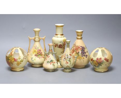 A small group of Royal Worcester blush ivory - a pair of globe pot pourri, a pair small vases and three vases,17cm