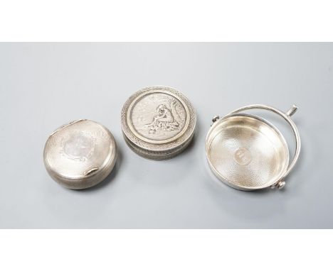 An early 20th century French engine turned white metal compact, 55mm, a similar circular box and embossed cover by Charles Ba
