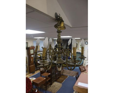 A 19th century Dutch brass six-light electrolier with star-shaped base and drop