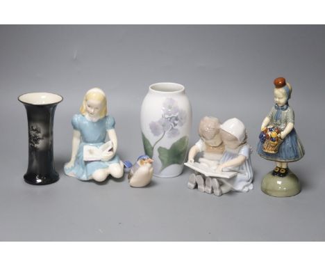 A group of figurines to include Royal Copenhagen, Doulton etc., a Royal Copenhagen vase and a Royal Worcester vase,16cm