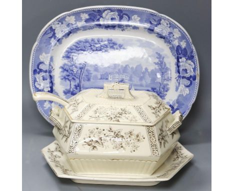 A late 19th century Staffordshire blue and white transfer-printed oval meat dish, ‘The Rokery’, depicting a country house wit