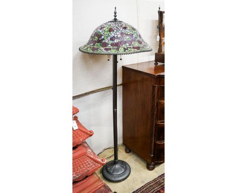 A bronzed finish Tiffany style standard lamp with shade, 160cm high, 59cm diameter