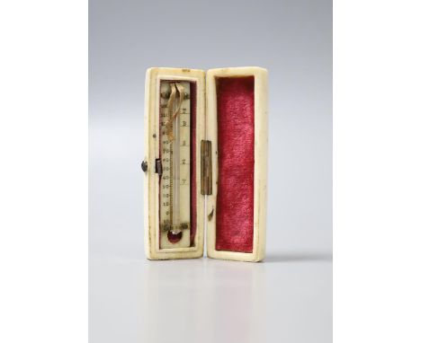 A George III ivory toothpick case, now containing a small thermometer and A Sevres style gilt metal mounted porcelain snuff b