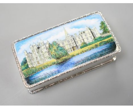 A modern Garrard &amp; Co silver and enamel snuff box, decorated with manor house scene, Birmingham, 1986, 94mm, gross 147 gr